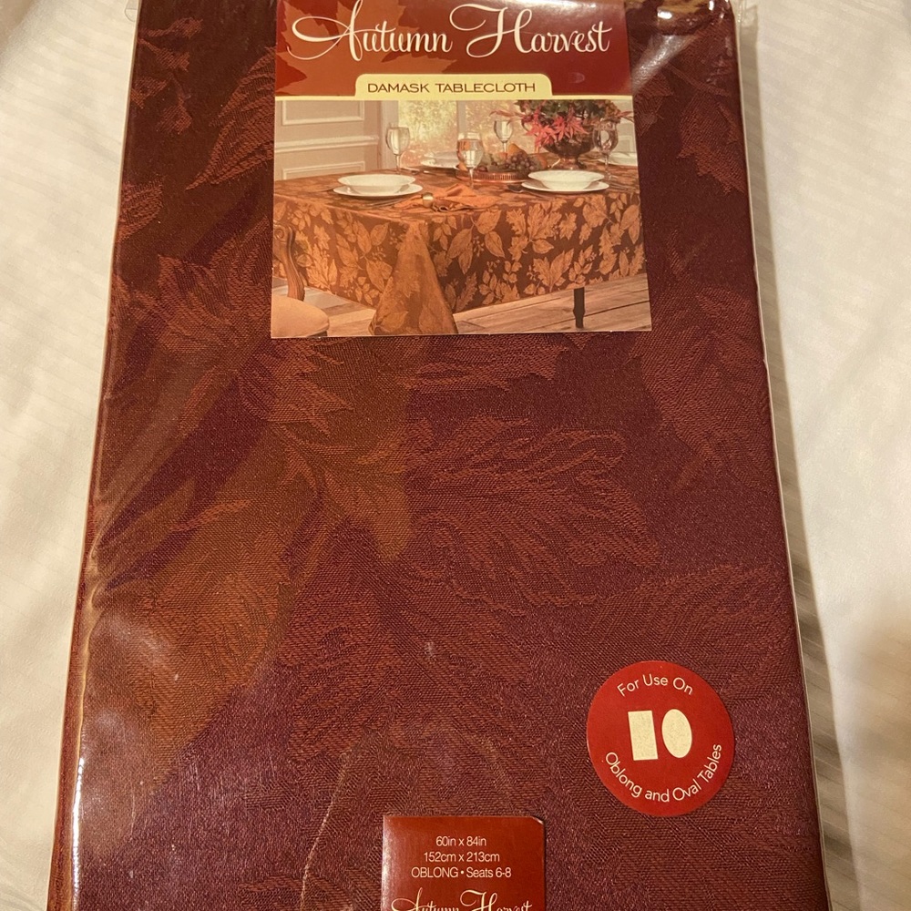 Brand new with tag tablecloth, oblong, 60_ 80 inches